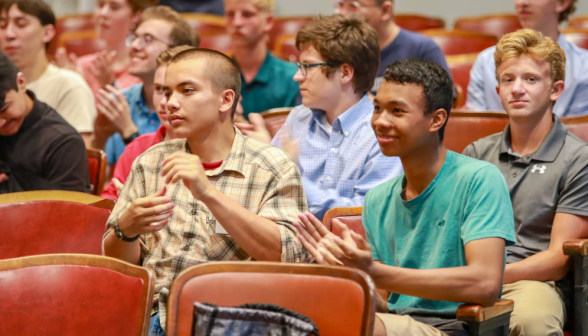 Students listen to the talk in Dolben