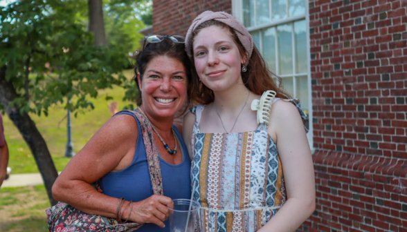 A student poses with her mother