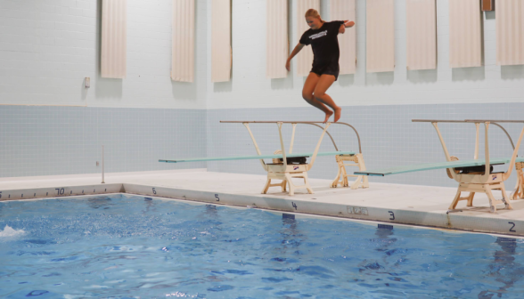 The other student jumps off the diving board