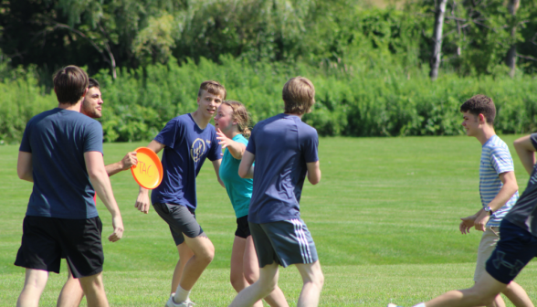 Students play Frisbee