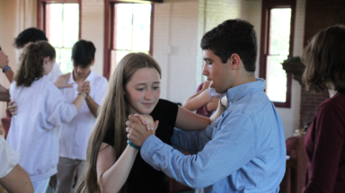 A student pair dances