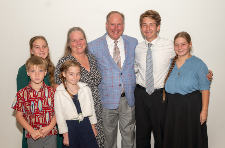 Justin Alvarez ('97) with his family