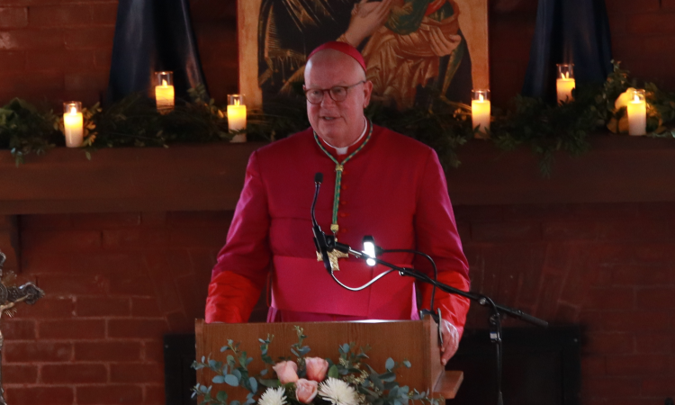 Bishop Byrne delivers a speech at the reception following the dedication of Our Mother of Perpetual Help Chapel