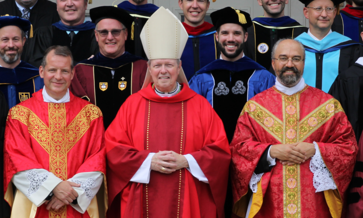 Bishop Scharfenberger poses with the New England chaplains