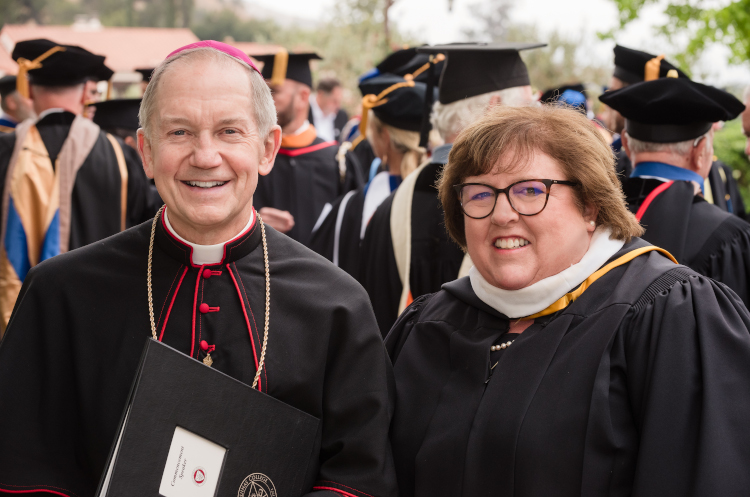 Bishop Paprocki and Anne Forsyth at Commencement 2021