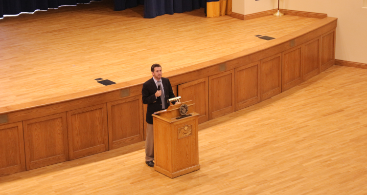 Dr. Cooper delivers his orientation lecture to the students