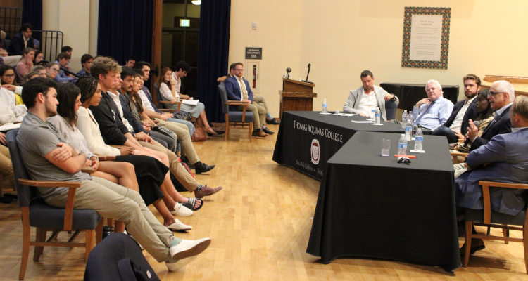 Long shot of the students and panelists