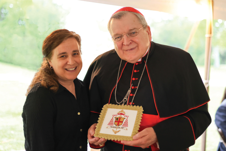 Cardinal Burke and Helene Froula