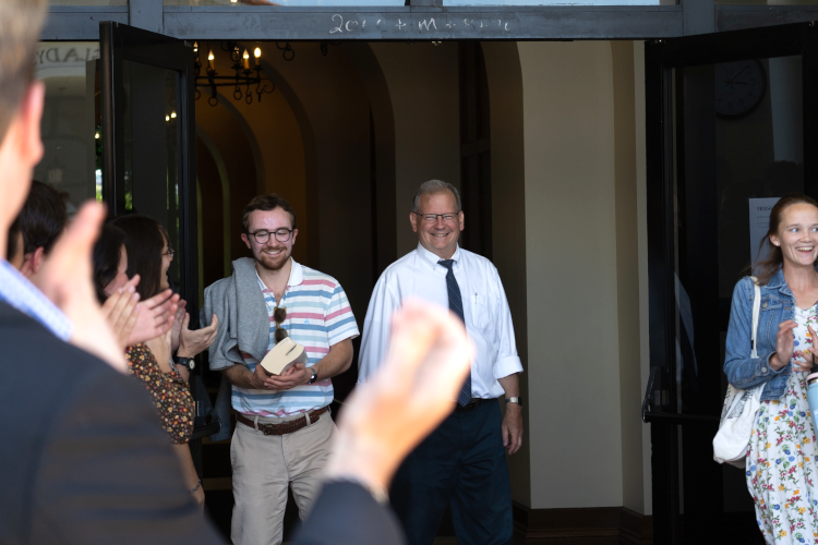 Dr. Collins exits his final class