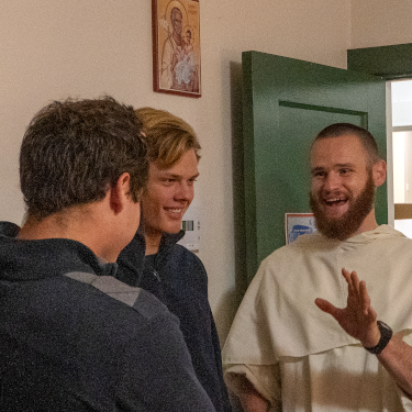 Br. Michael Thomas Cain (’18) visit swith students