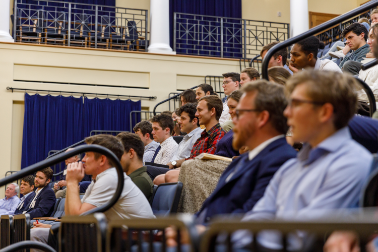 members of the senior class listen to a talk