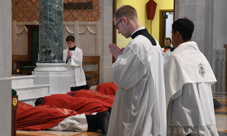 Fr. Hanley assists at Good Friday