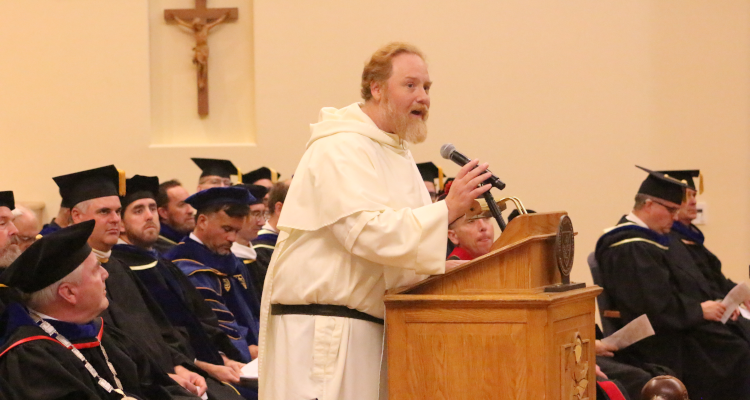 Fr. Hurley addresses the students at Matriculation