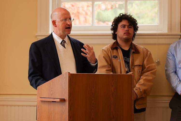 Dr. Joseph Froula, and a student worker who is very sorry he got in the frame