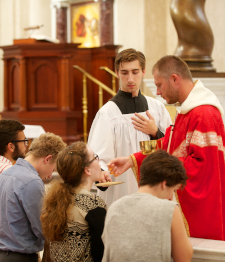 Students receive Holy Communion
