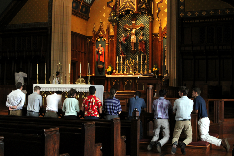 Students at the altar