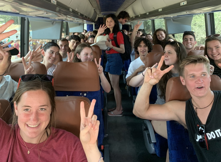 Students on bus to the beach