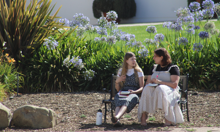 Two students on bench