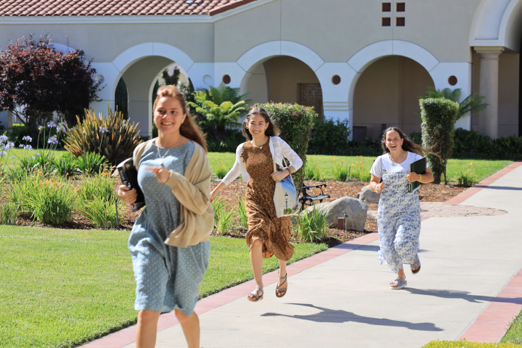 Students run across campus
