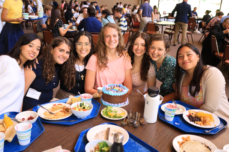Prefects bring Peachy a birthday cake