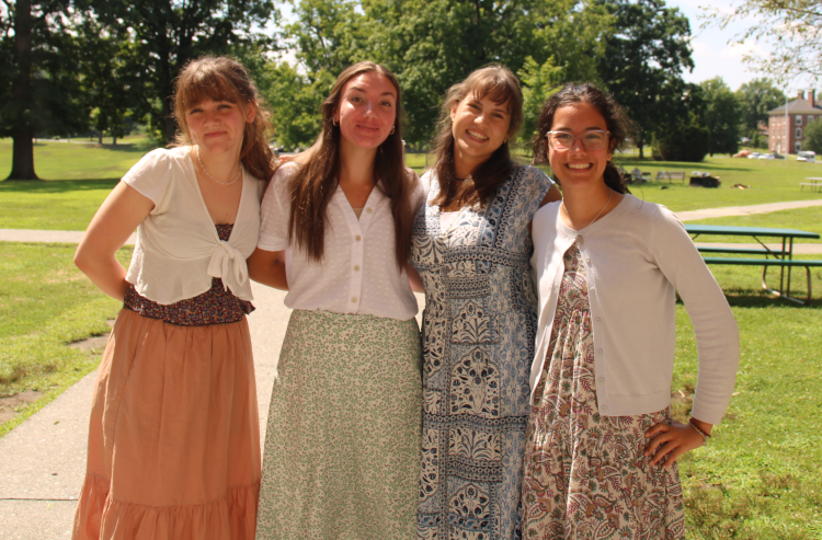 Four students on the New England campus