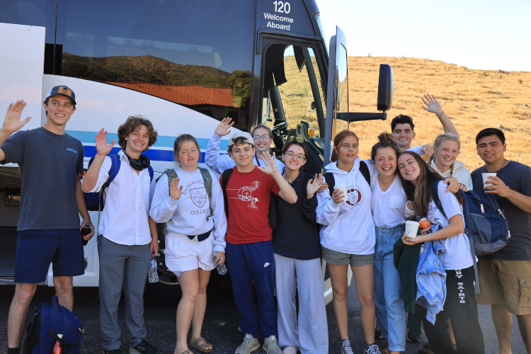 Students outside bus
