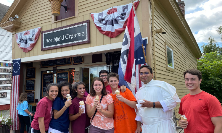 Fr. Miguel with students at the Creamie