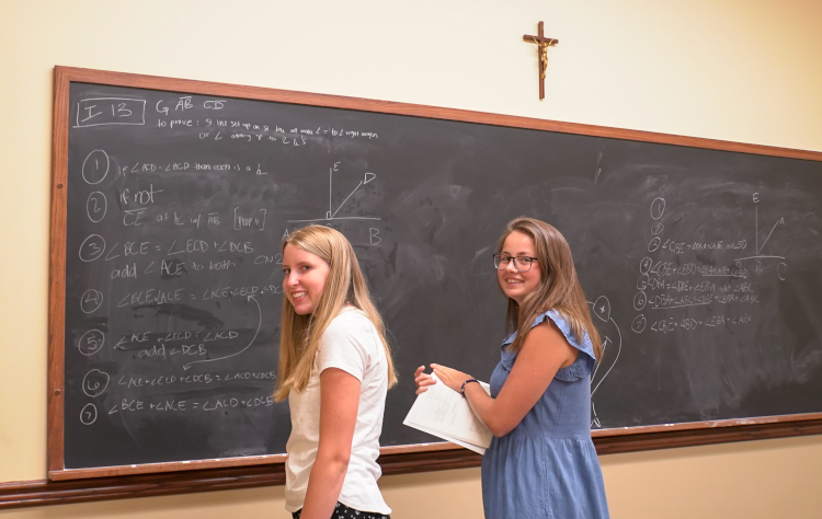 Students at blackboard