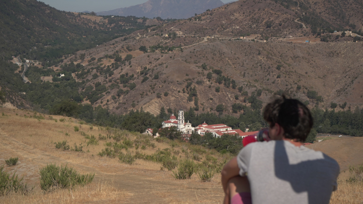 Students looks at Chapel in the distance