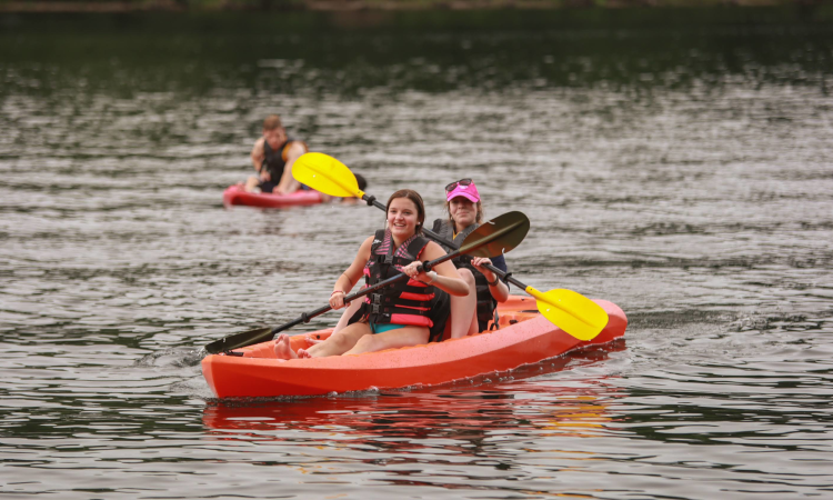 Two out on the river in their kayak