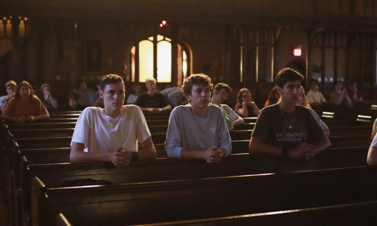 Students praying the Rosary in the Chapel