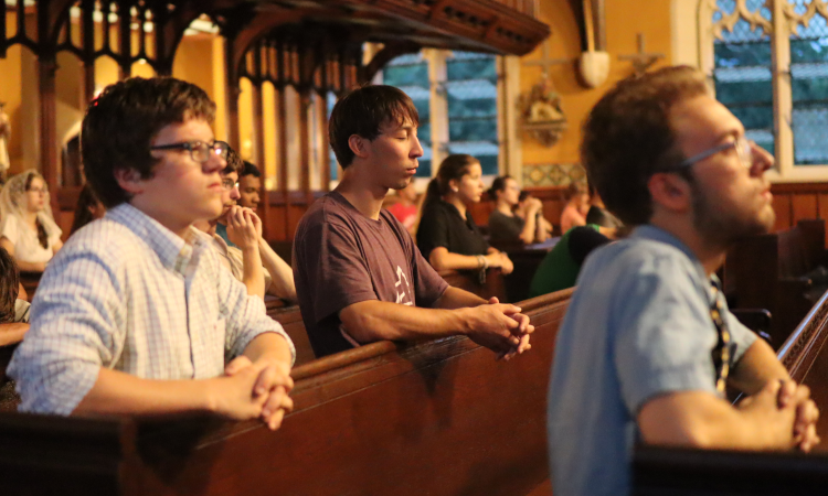 Students pray the Rosary in the Chapel