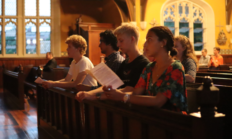 Students pray the Rosary in the Chapel