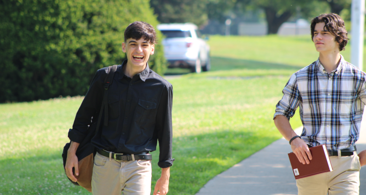 Two students walk together