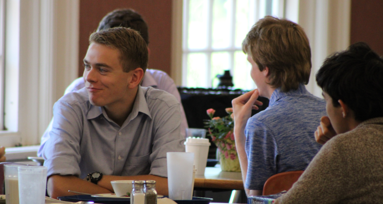 Students chat at the lunch table