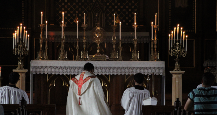 Fr. Miguel performs Benediction
