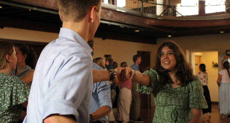 A student pair dances