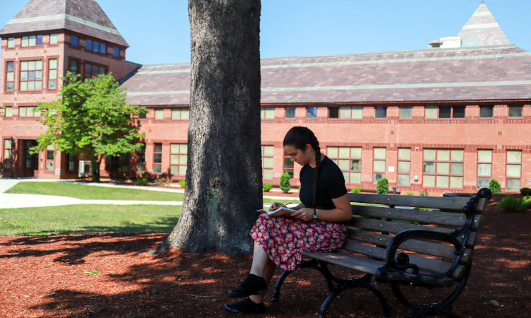 Student studies outside Dolben Library