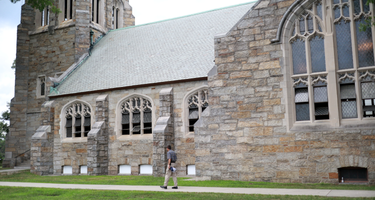 Students walks outside Chapel