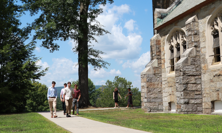 Students walk by Chapel