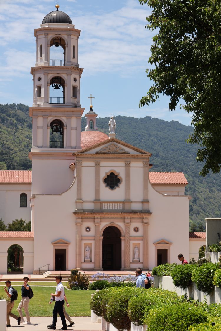 Students walk past Our Lady of the Most Holy Trinity Chapel