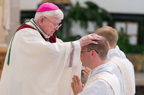 The Most Rev. Paul J. Bradley, Bishop of Kalamazoo, Michigan, ordains Rev. Jeffrey Hanley (’13), and Rev. Maximilian Nightingale (’13)