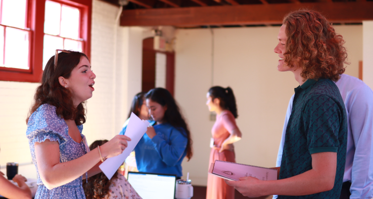 Admissions greets a new student at Registration