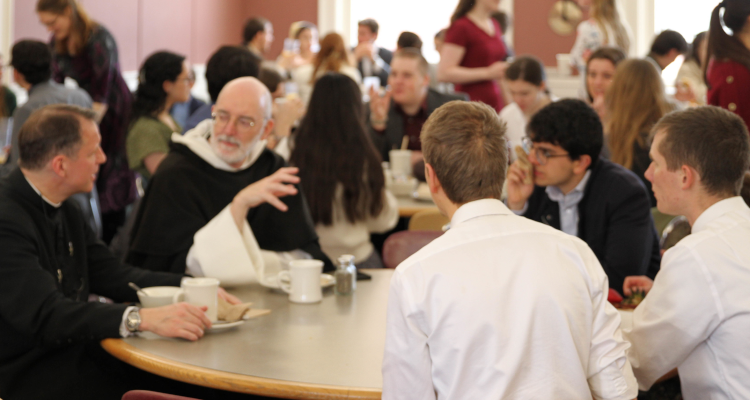 Fr. Sherwin eats with students at brunch