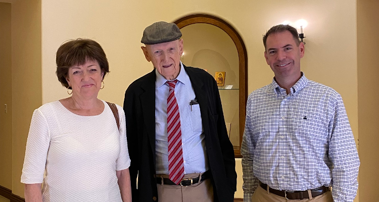 Dr. Neumayr during his last visit to the California campus in 2021 with daughter Anne (’05) and son-in-law Brooks Braden (’97)