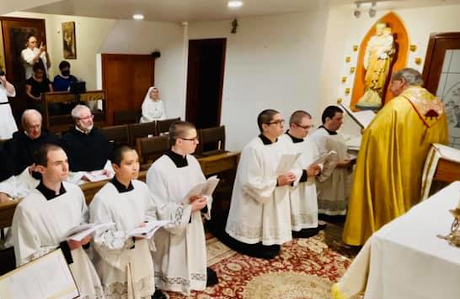 Br. Edward Seeley (’16), third kneeling from the left, enters the novitiate with the Canons Regular of the Immaculate Conception
