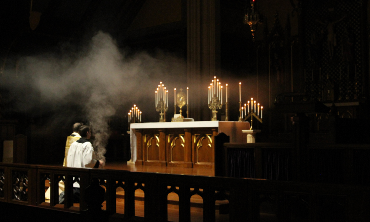 Smoke, incense, and candles before Our Lord in the monstrance