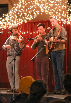 Three students perform at a California open-mic night