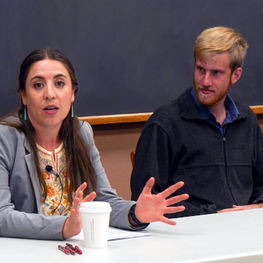 Alumna psychologist Dr. Helena Orellana (’11) addresses students