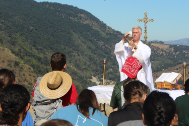 Fr. Sebastian offers outdoor Mass during a hike
